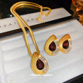 Gold Tone Red Teardrop Necklace and Stud Earrings with Polished Metal Accents view 1