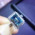 Blue Emerald Cut Halo Crystal Ring in Polished Metal view 2