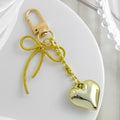 Puffy Heart Charm Keychain with Bow, Cross, and Clover Designs view 6