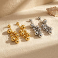 Graduated Metal Ball Cluster Drop Earrings in Polished Gold Tone view 3