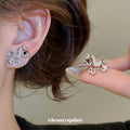 Gold and Silver Tone Open Rocking Horse Stud Earrings view 3