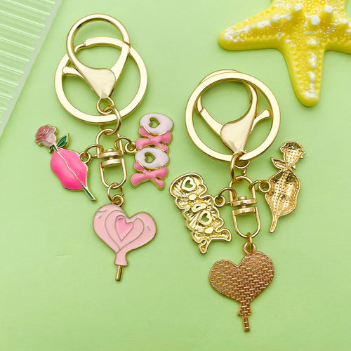 Image 2 showing a pair of key chains with charms.