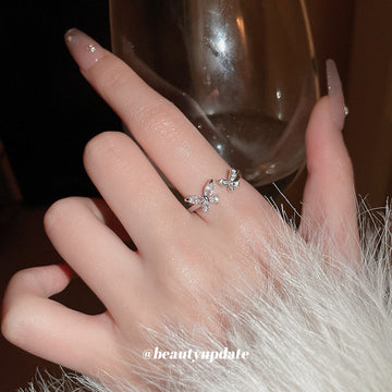 Silver Tone Open Ring With Large And Small Crystal Butterflies