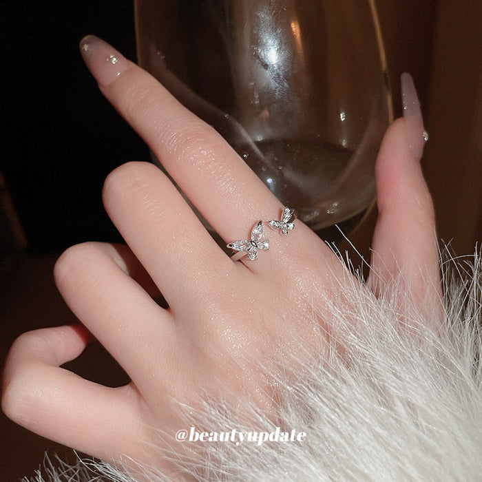Silver Tone Open Ring With Large And Small Crystal Butterflies