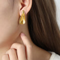 Sculpted Teardrop Stud Earrings Smooth Gold Or Steel Metal view 6