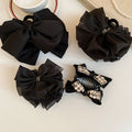 Black Fabric Bow Shark Hair Claw Clip Plain Rhinestone view 3