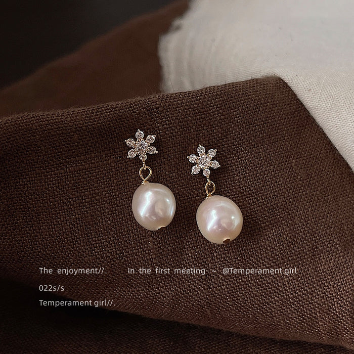 Gold Tone Clear Stone Snowflake And Irregular White Pearl Earrings
