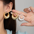 Sculpted Ribbed Open Round Hoop Earrings in Gold and Silver view 1