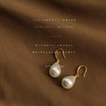Gold Tone White Pearlescent Teardrop Hook Earrings For Women view 3