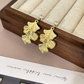 Gold and Silver Layered Fan Leaf Dangle Stud Earrings view 3