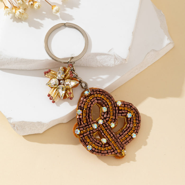 Beaded Bronze Knot Keychain With Rhinestone Flower Charm