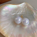 Large Iridescent White Round Pearl Stud Earrings Matching Pair view 1