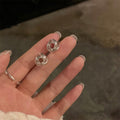 Twisted Knot Metal Clip On Earrings in Two Finishes view 6