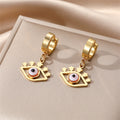 Gold Tone Hamsa Star and Lash Evil Eye Huggie Drop Earrings view 6
