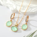 Gold Tone Pale Green Oval Stone Necklace and Huggie Earrings view 5