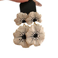 White Double Flower Statement Stud Earrings with Black Centers view 5