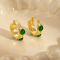 Green Oval Crystal Look Textured Gold Tone Huggie Earrings view 1
