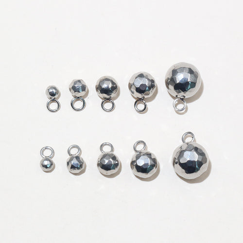 Finish comparison of polished metal ball charms in ten size and finish options