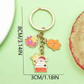 Christmas Charm Keychains Featuring Red Bow Across 81 Pictured Variations view 1