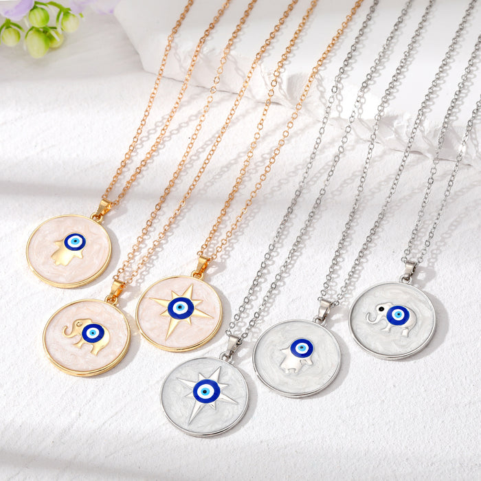 Gold and Silver Tone Round Hamsa Elephant and Star Eye Necklaces