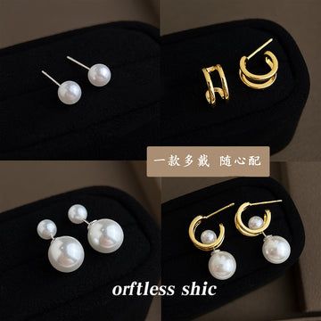 Gold Huggie Hoop Earrings with Oversized White Pearl Drops