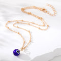 Gold and Silver Tone Blue Evil Eye Bead Pendant Necklaces view 4