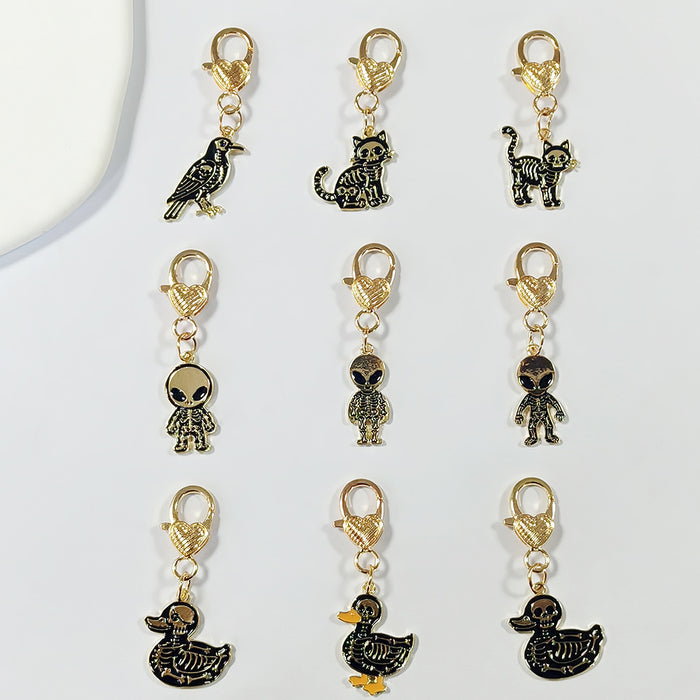 Gold Tone Gothic Skeleton Cat, Duck and Alien Heart-Clasp Charms