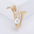 Pearl Saxophone Brooch With Faceted Crystals And Polished Metal Details view 2