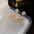 Gold-Tone Faux Pearl and Cubic Zirconia Mermaid Tail Earrings view 6