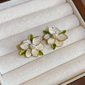 White Layered Flower Stud Earrings With Gold Tone Edges view 6
