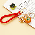 Coin and Persimmon Charm Keychains with Braided Wrist Loops view 10