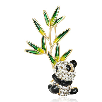 Front view of panda and bamboo enamel brooch with crystal details
