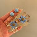 Wire Frame Flower Drop Earrings with Woven Rose Centers view 4