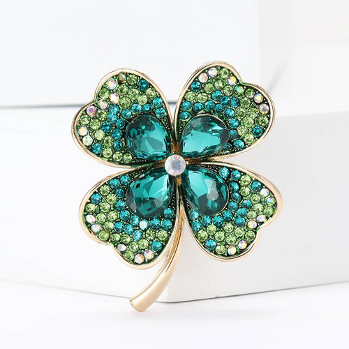 Angled display of the four leaf clover brooch in four crystal color variations