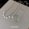 Silver Star Moon and Cloud Charm Necklace with Polished Metal Details view 4