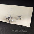 Silver Asymmetric Star Stud Earrings Cat Eye Accent Pair view 6