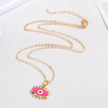 Gold Tone Spiked Crystal Evil Eye Pendant Necklaces in Five Colors view 4