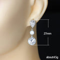 Three Stone Crystal Drop Earrings in Polished Metal view 4