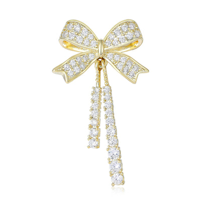 Front view of crystal bow brooch with double dangle strands decorative metal pin