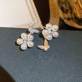 Butterfly and Floral Drop Stud Earrings in Two Styles view 6