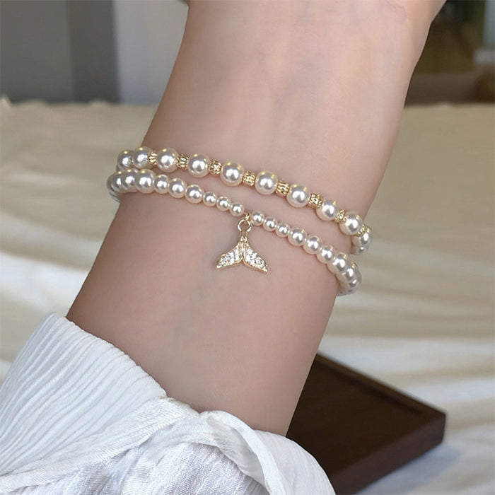 Three Mixed Pearl Like Bracelets With Tail Cluster Or Oval Center