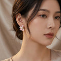 Pink Four Petal Flower Gold Tone Small Stud Earrings view 1