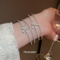 Double Row Crystal Flower Open Cuff In Gold Or Silver Tone view 1