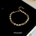 Gold Tone Bracelet With Red Green Pink And Clear Round Crystals view 2