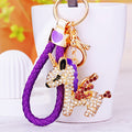 Jeweled Winged Unicorn Keychain with a Braided Wrist Loop view 1