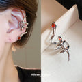 Silver Tone Red Eye Snake Ear Cuff With Decorative Metal Accents view 1