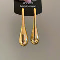 Long Teardrop Stud Earrings in Gold and Silver Tones view 6