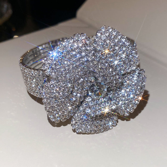 Silver Tone Open Cuff Bracelet With Layered Crystal Flowers