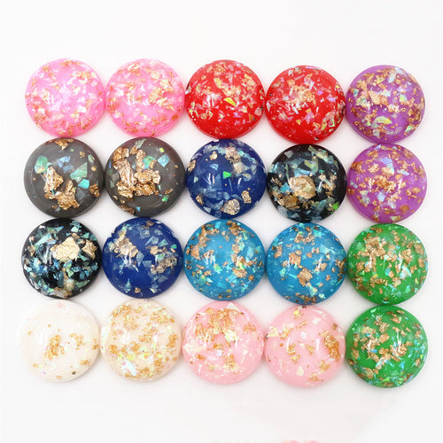 Round cabochons arranged assortment on a white background