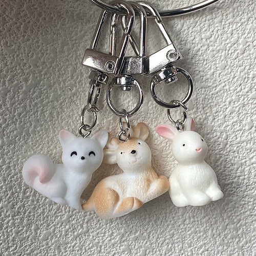 Close-up showing the colors and surface details of flocked Deer Hedgehog Rabbit Cat and Swan Clip Keychains